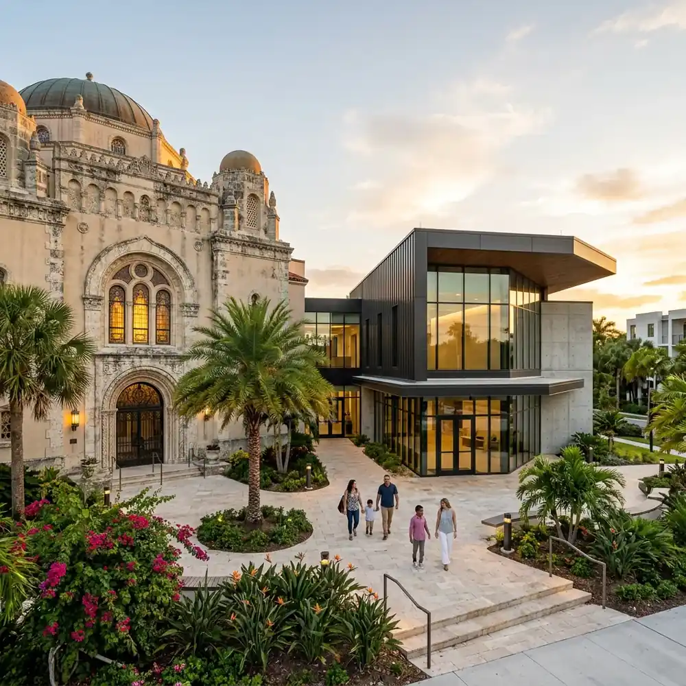 Modern annex addition built beside a historic Florida synagogue with landscaped entry plaza